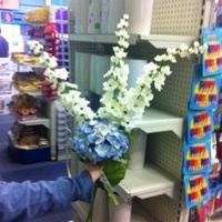 Pew ends.... silk flowers.... flower people in here!