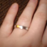 our wedding rings *flash*