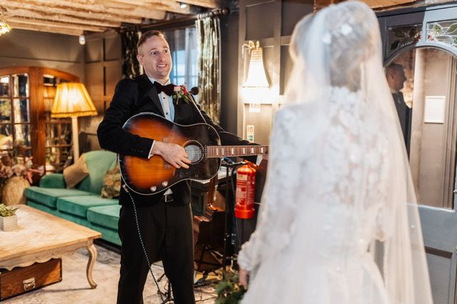 Groom playing for the bride