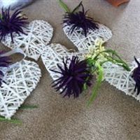 Cadbury purple wedding bits: table runners, favour boxes, wooden hearts, small bouquet, posy, ribbon
