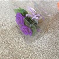 Cadbury purple wedding bits: table runners, favour boxes, wooden hearts, small bouquet, posy, ribbon