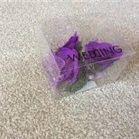 Cadbury purple wedding bits: table runners, favour boxes, wooden hearts, small bouquet, posy, ribbon