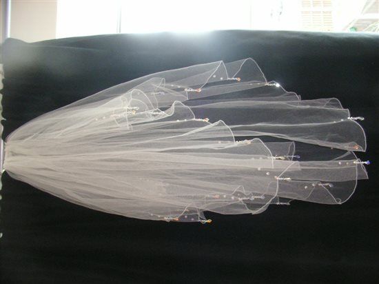 My wedding dress, veil, tiara and watch flash!