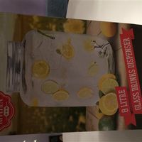 Pastel ribbon and lace chair decorations, paper lanterns and other lovely wedding bits