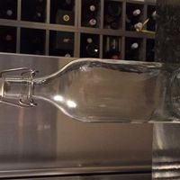 Pastel ribbon and lace chair decorations, paper lanterns and other lovely wedding bits