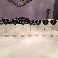 Pastel ribbon and lace chair decorations, paper lanterns and other lovely wedding bits