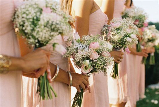 Re: Should bridal party flowers match table flowers?