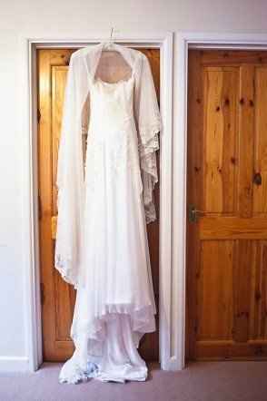 Re: Can we get a post of pics showing everyone's dresses please??