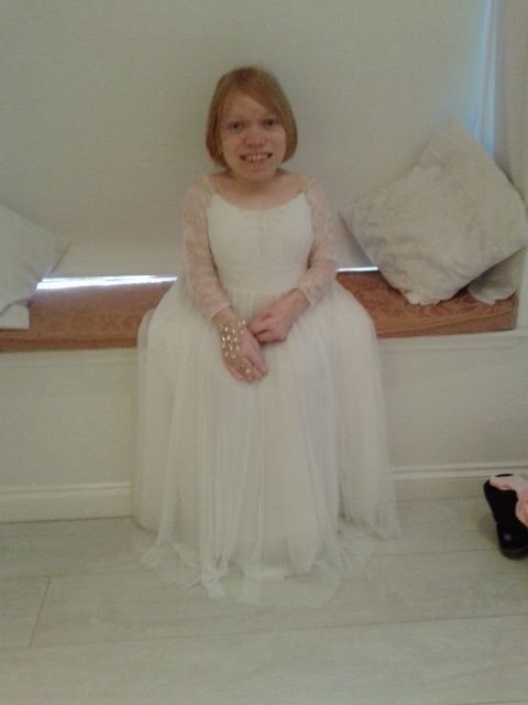 Re: How would you describe your dress? Include *flashes* if you want!