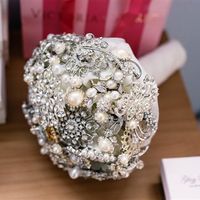 Re: Anyone making button/brooch bouquets?