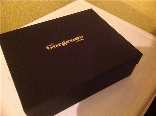 Re: What are you buying for your grooms the morning of the wedding?