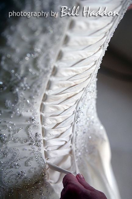 Re: Is it possible to do up a corset back on your own?