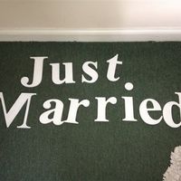 21 wedding magazines and Just Married wooden signs