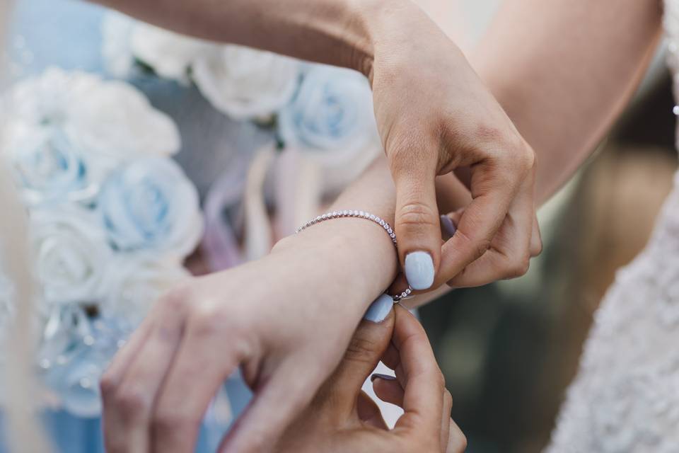 Putting bracelet on