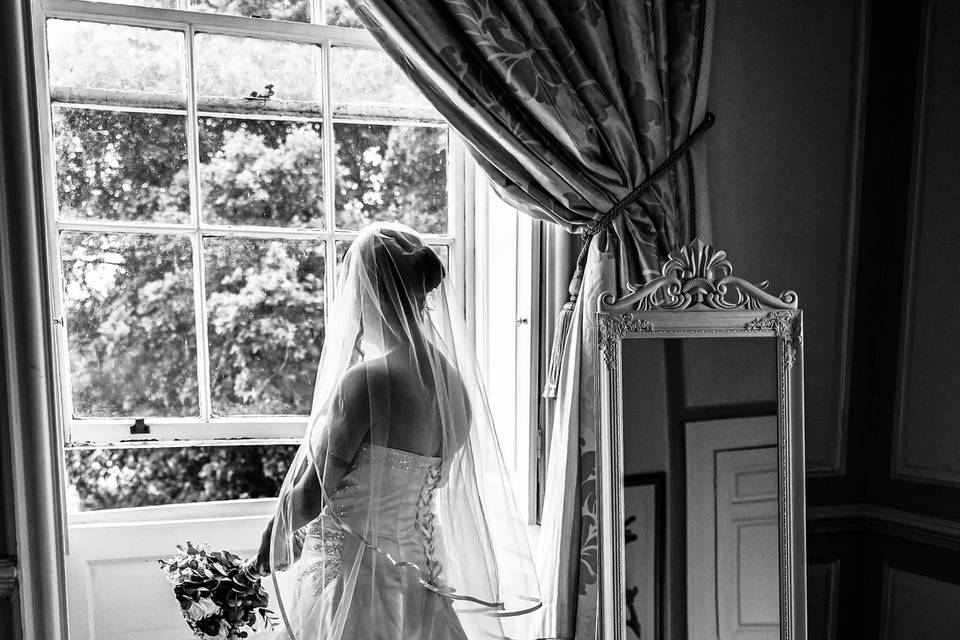 Bride next to the window