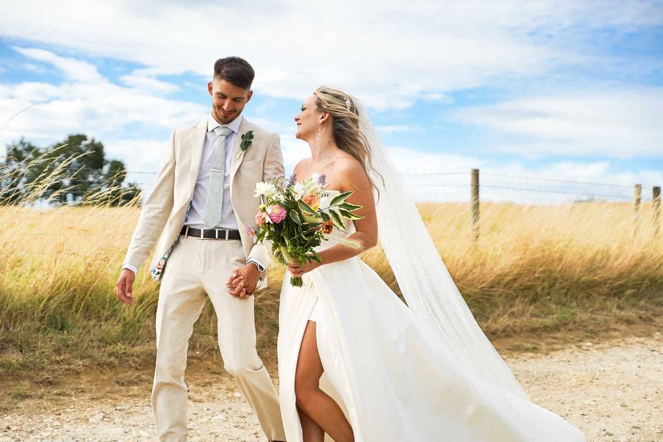 Bride and groom in the field