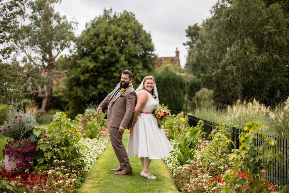 Pair walking and holding hands - Laura Ellen Photography