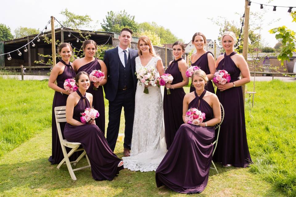 Couple with members of the wedding party -  Laura Ellen Photography