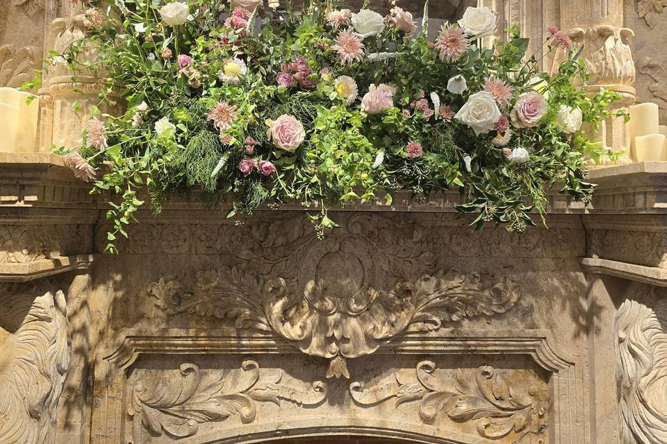 Mantlepiece flower arrangement