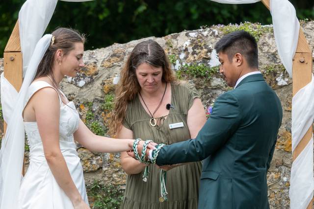 Hand holding. Groom and bride