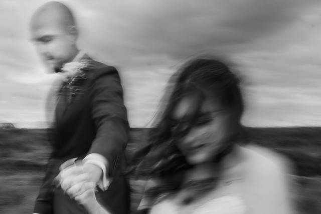 Bride and Groom holding hands