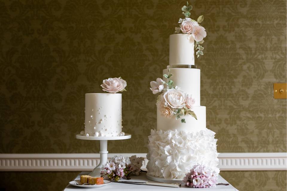 Four tier cake with ruffles