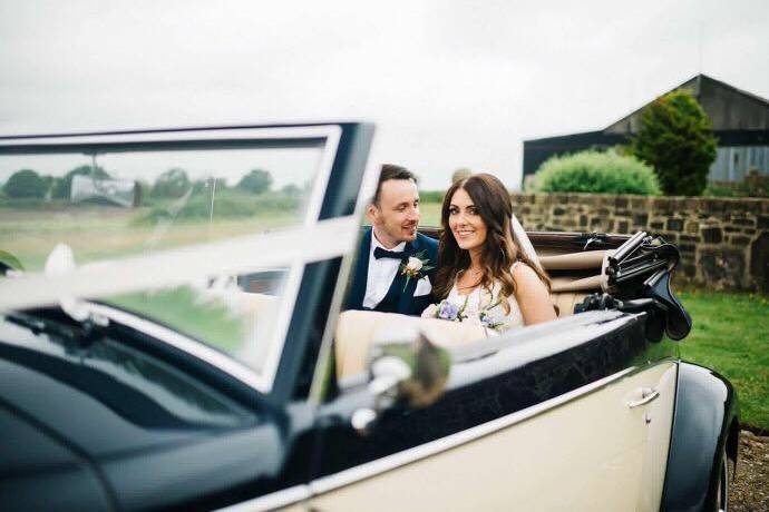 Newlyweds in car