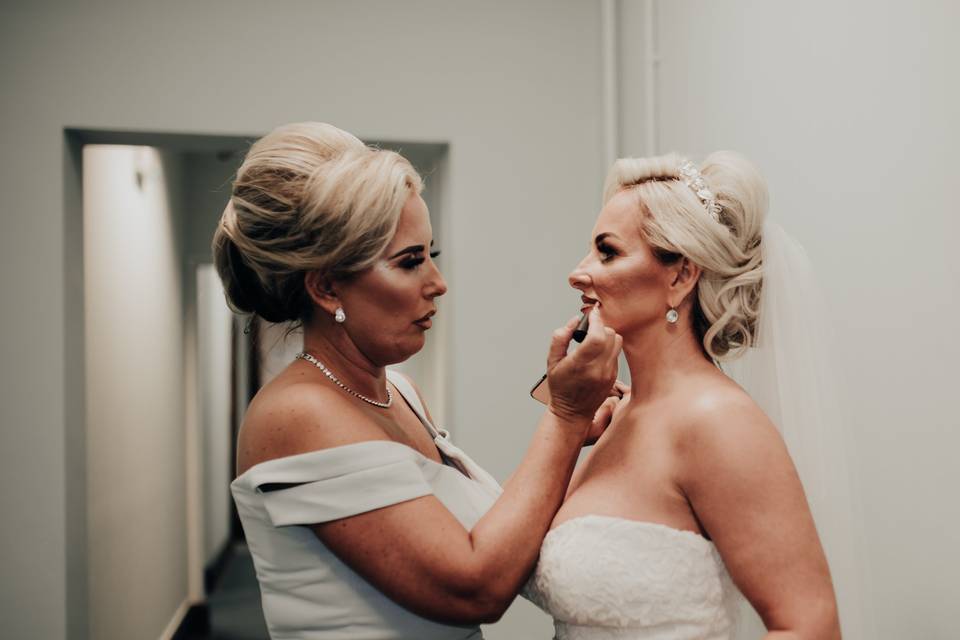 Bride getting her make up