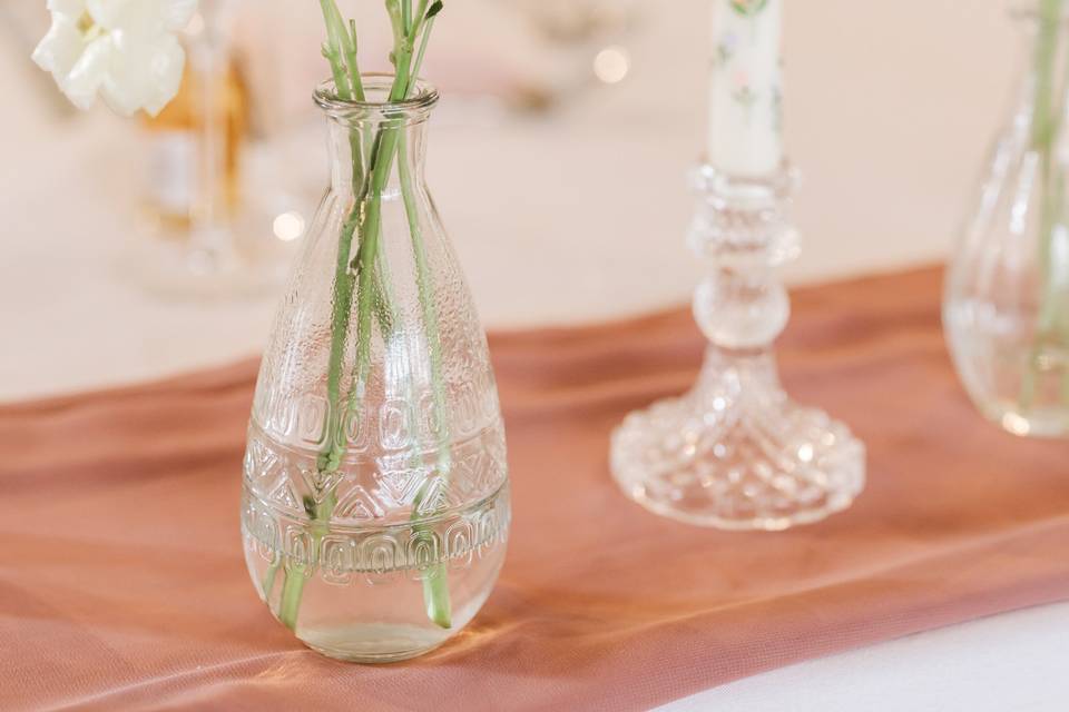 Pastel bud vase and candle