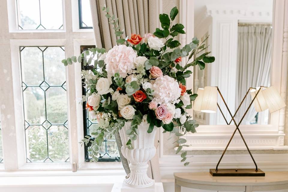 Floral urn and pedestal