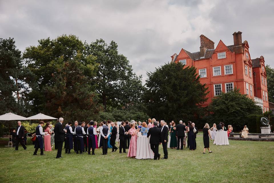 Outdoor lawn drinks reception