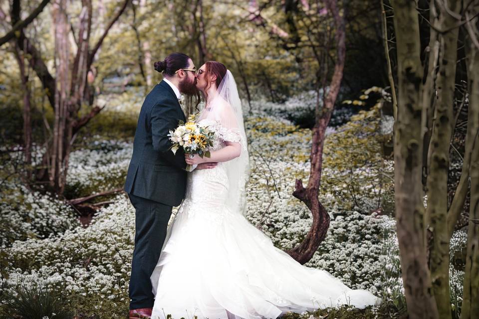 Bride and Groom Woodland Kiss