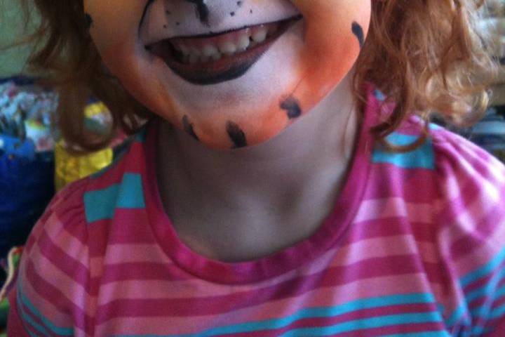 Loving having her face painted