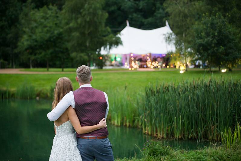 Marquee in distance over lake