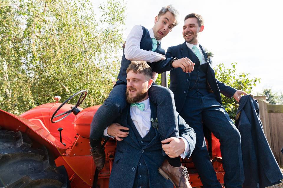 Groom gives piggyback tractor
