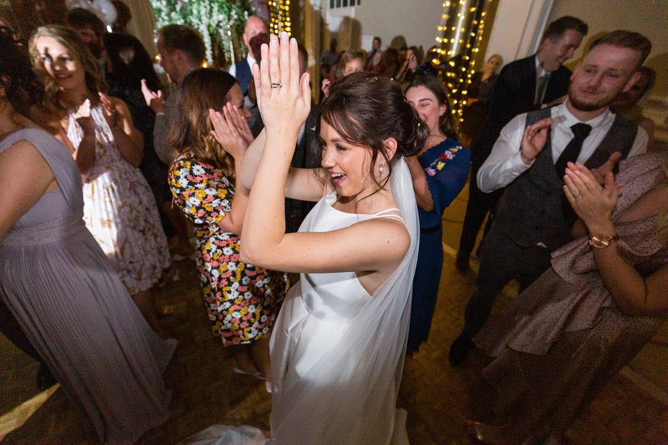 Bride dancing during party