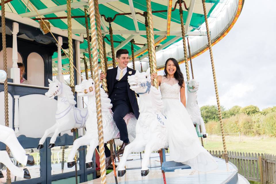 Bride groom on carousel