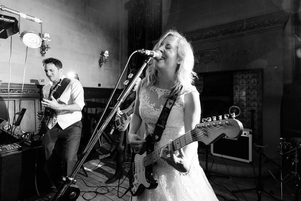 Bride singing in band wedding