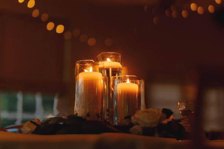 Glass cylinders with candles