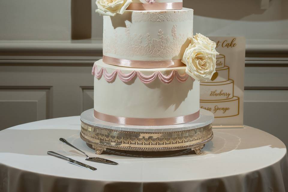 Four tier fondant cut-out cake