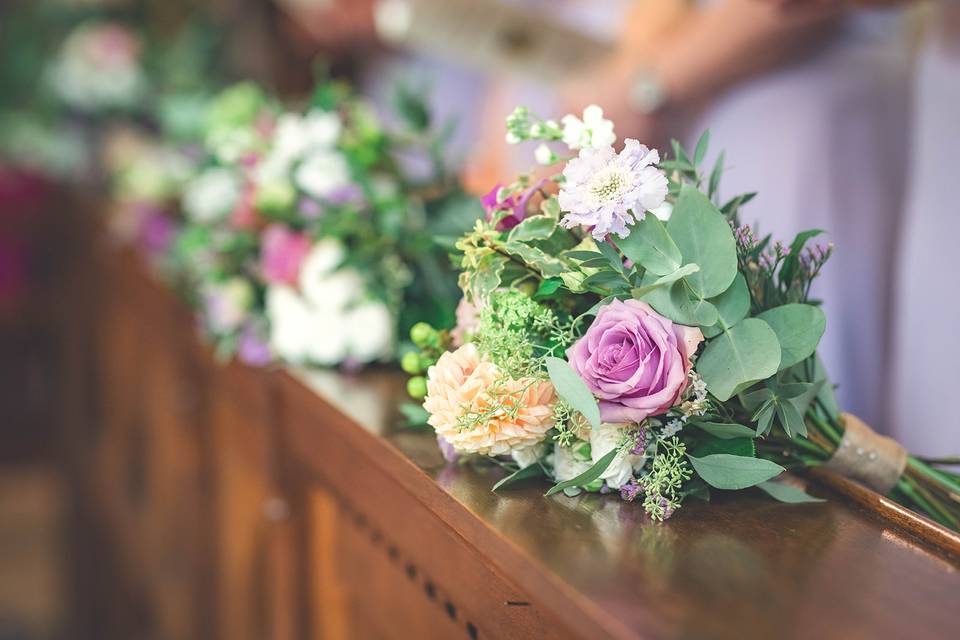 Flowers on the pews