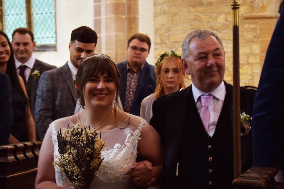 Guest-of-honour comes down the aisle