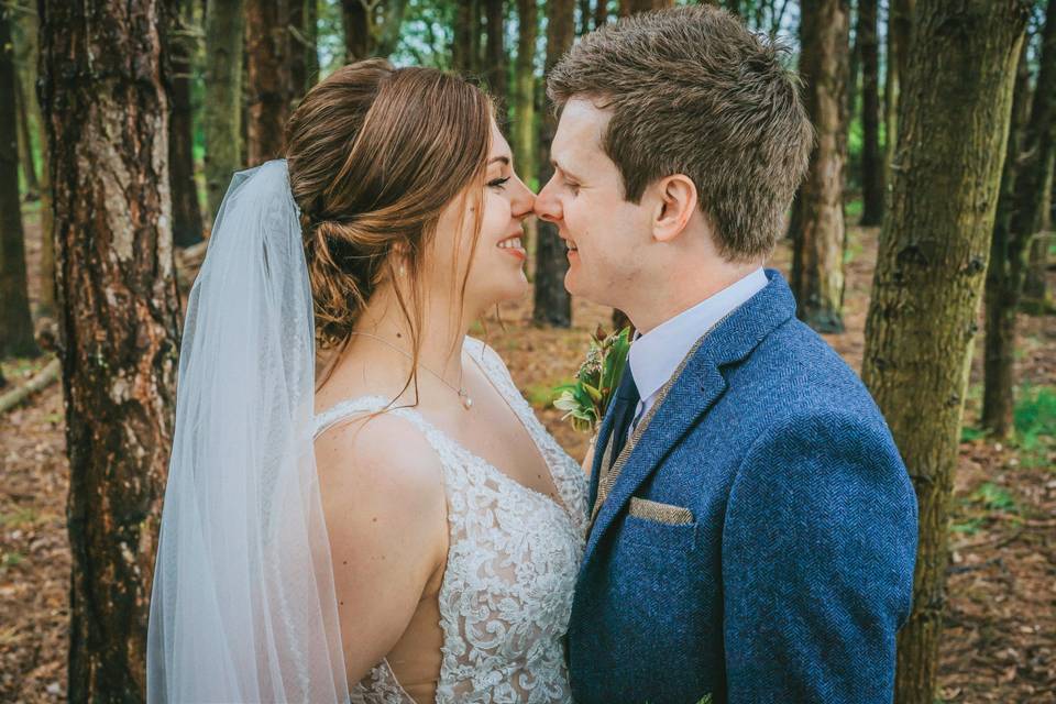 Bride looks into grooms eyes