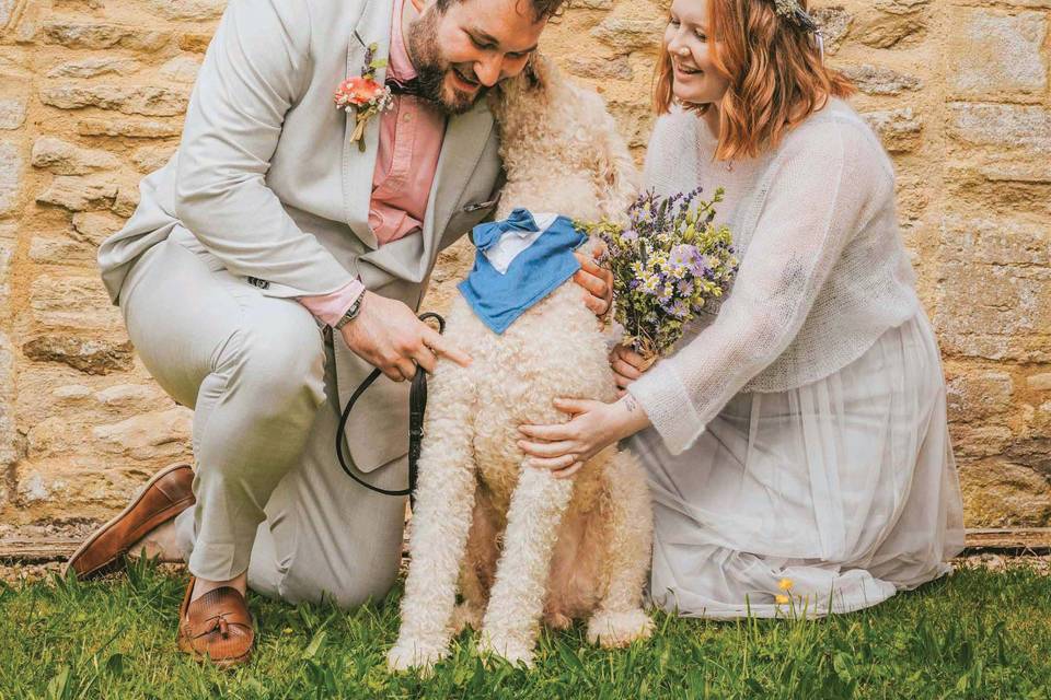 Bride and groom with dog