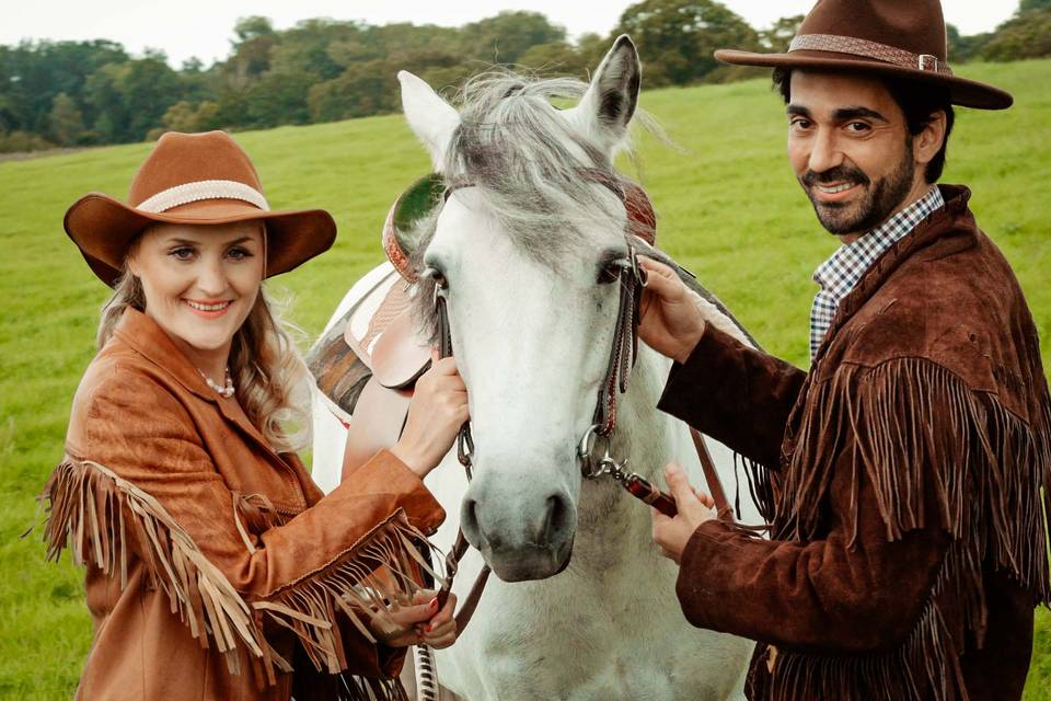 Bride and groom with horse