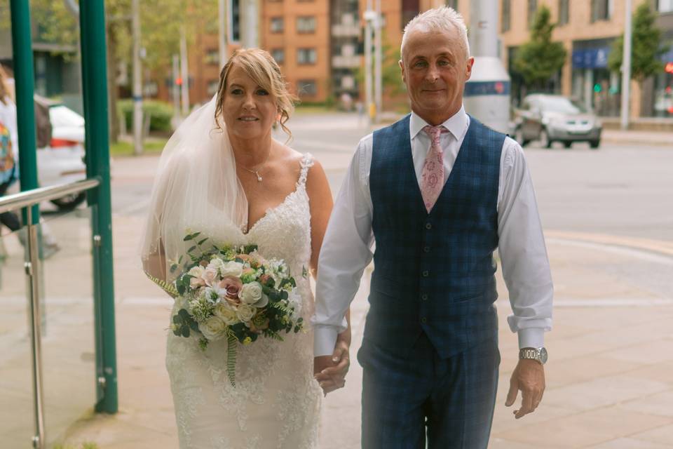 Bride and groom walking