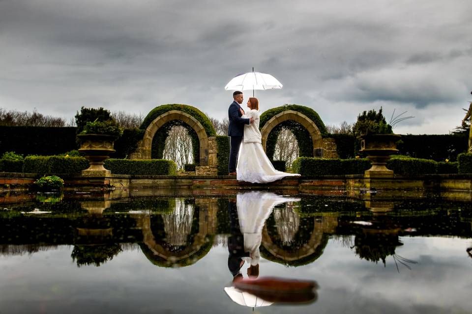 Wedding couple reflection.