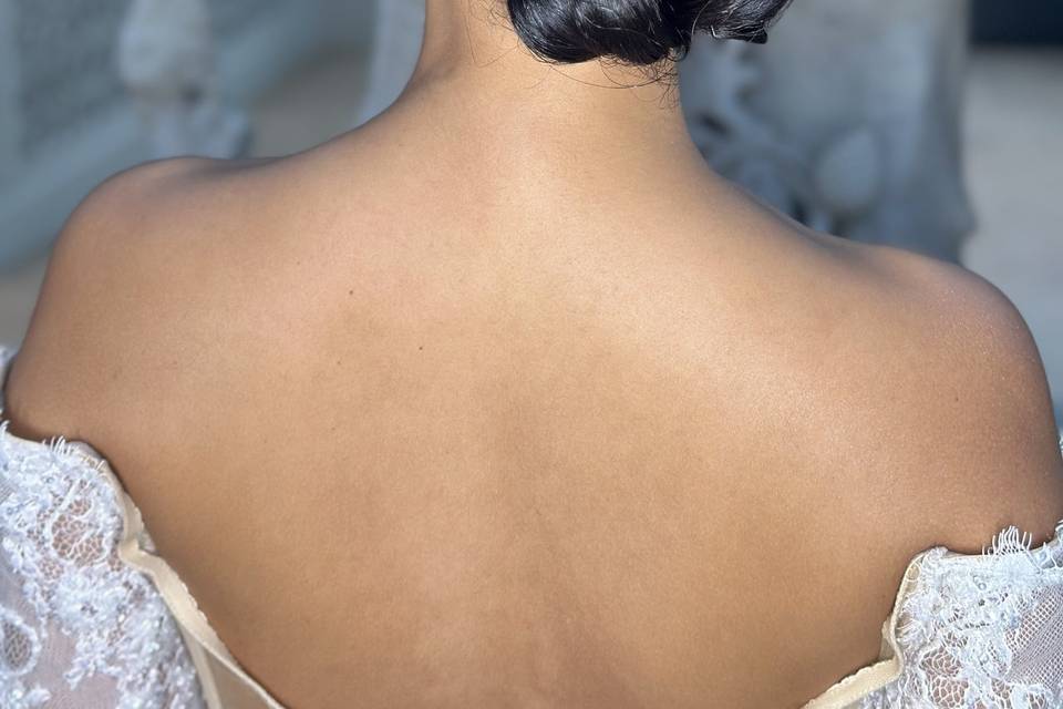 Low polished bridal bun