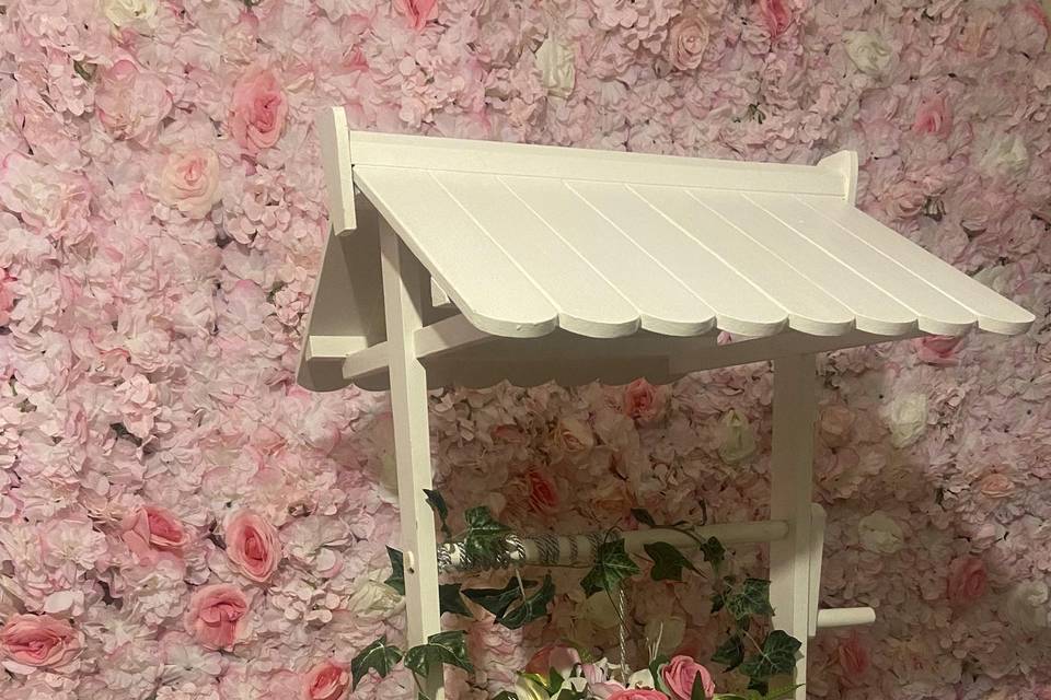 Pink floral wishing well