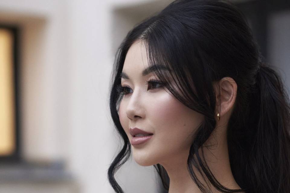 Soft glam makeup and ponytail